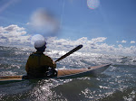 Doug Van Doren paddling into the wind. Lake Michigan. Wind 25-30 knots. Waves 3-7 feet. visit http://keithwikle.com