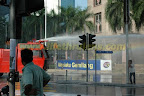 brave guy behind the street light. he stood till water tank moved away brave guy behind the street light. he stood till water tank moved away