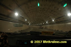 the tunnel has spherical roof since it is actually a round tunnel