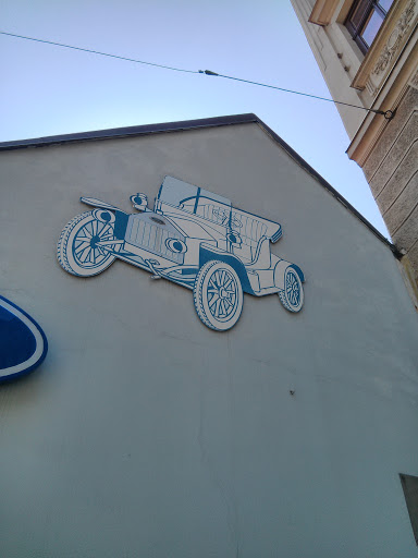 Old Car on Wall
