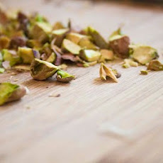 Pistachio Pesto Pasta With Green Peas And Walnut Parmesan