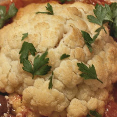 Whole Baked Cauliflower With Tomato and Olive Sauce