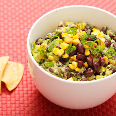 Guacamole with Charred Corn, Black Beans, and Scallions
