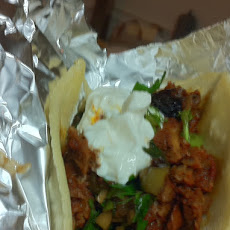 Chipotle Braised Lamb Tacos with Olives and Balsamic Soaked Raisins
