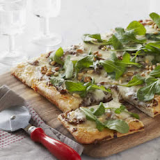 Caramelized Onion and Arugula Pizza