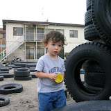 Eidan was more interested in playing in the sand than the tires