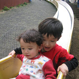 Kai and Eidan on the long slide at Robot Park