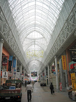 The covered shopping district in Kagoshima City, known as Tenmonkan. The roof is there to protect against ash from the nearby volcano.