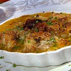 Baked Gulf Oysters and Shrimp with Garlic, Lemon Butter, and Crabmeat