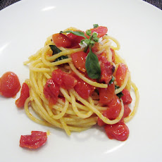 Spaghetti with tomatoes, basil and pecorino romano
