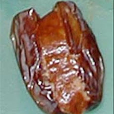 Linguiça-Stuffed Medjool Dates Wrapped  With Bacon
