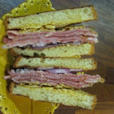Sandwich w/ Ham, Proscuitto, Crispy Gruyere & Lemon Aioli