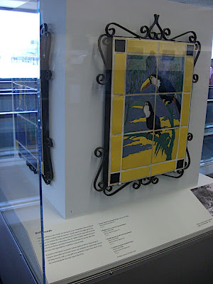 Toucan mural (a different bird mural shows on all 4 sides of display)