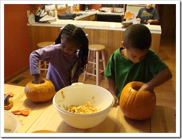 Kiahna and Jadon getting out the seeds