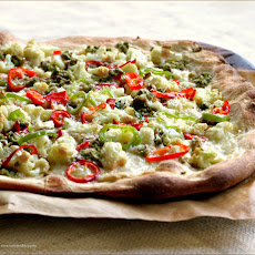 Pizza with Roasted Cauliflower, Calabrian Chiles and Green Olive Tapenade