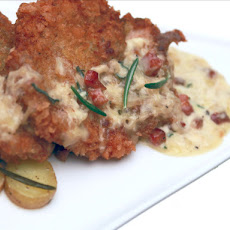 Pan Fried Chicken Thighs with Pancetta Cream over Confit Potatoes
