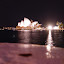 Night view of the Sydney Opera House across Sydney Cove from Circular Quay near The Rocks