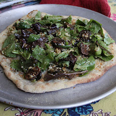Smoked blue cheese and mixed greens flatbread with fig, pecan vinaigrette