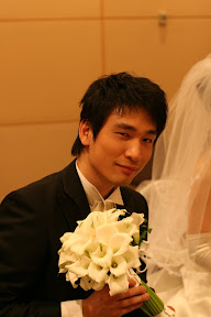 結婚式の新郎の写真の撮影の結婚