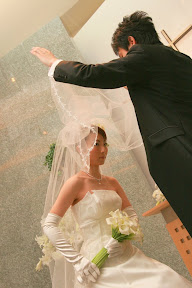 ウェディングのベールの写真の撮影の結婚