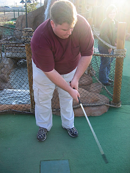 Jeffy and his first miniature golf swing.