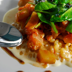 Creamy White Wheat Berry Porridge with Eggplant Stew and Wilted Spinach