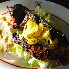 The Rev. EJ's Pork Steak Po'Boy