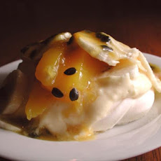 Pavlovas With Lemon Curd and Tropical Fruit