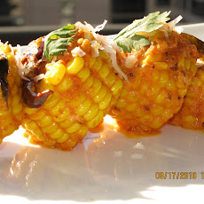 Corn in a spicy sauce of yoghurt, curry leaves, grated coconut and toasted red chillies