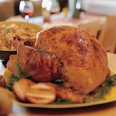 Spice-Rubbed Smoked Turkey with Roasted-Pear Stuffing and Cranberry Syrup