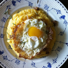 Grits with Old Bay and Rosemary Frizzled Shallots and an Olive Oil Fried Egg