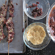 Chocolate Covered Bacon On A Stick With Marcona Almonds And Dried Cherries