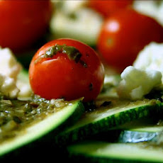 Zucchini and Grape Tomatoes in Pesto With Feta