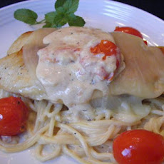 Mozzarella Topped Chicken With Roasted Tomato and Basil Sauce
