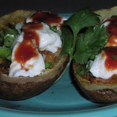 Delicious Cheesy Bacon and Green Onion Potato Skins