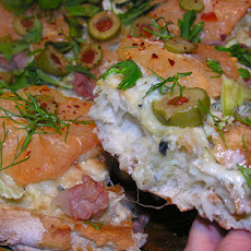 Pink grapefruit and green olive pizza