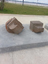Escultura De Piedra Ganchos