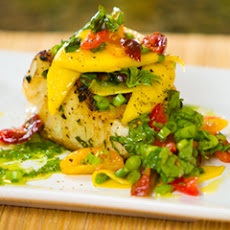 Grilled Sea Bass With Spinach And Pine Nut Pesto And Mango Cherry Tomato Salad