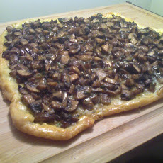 Mushroom Crostata with Roasted Garlic, Taleggio, and Thyme