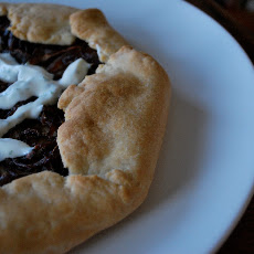 Brandied Red Onion Tart with Lemon Parsley Cream