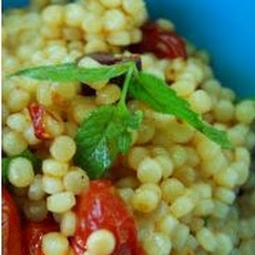 Pearl Couscous with Slow Roasted Cherry Tomatoes, Parsley, Olives and Mint