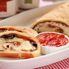 Classic Stromboli with Artichokes, Olives and Red Pepper Marinara