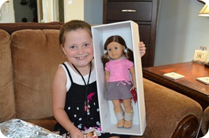 With her look-alike American Girl doll