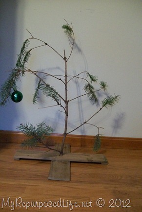 use a branch to make your own Charlie Brown Christmas Tree DIY Charlie Brown Christmas Tree