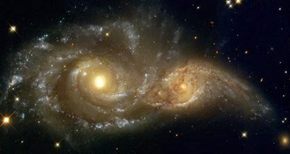 galáxias NGC 2207 e IC 2163