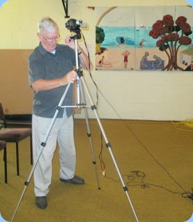 Gordon Sutherland preparing the video camera for use with the Big Screen. Photo courtesy of Dennis Lyons.
