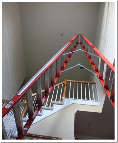 Hanging a chandelier in a foyer