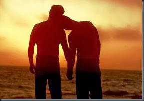 two-men-on-the-beach-at-sunset-holding-hands two-men-on-the-beach-at-sunset-holding-hands