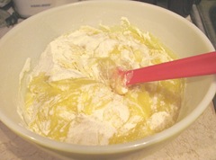 2 ingredient cans lemon filling and cake mix mixing in bowl