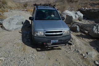 squeezing through the boulders in berdoo canyon